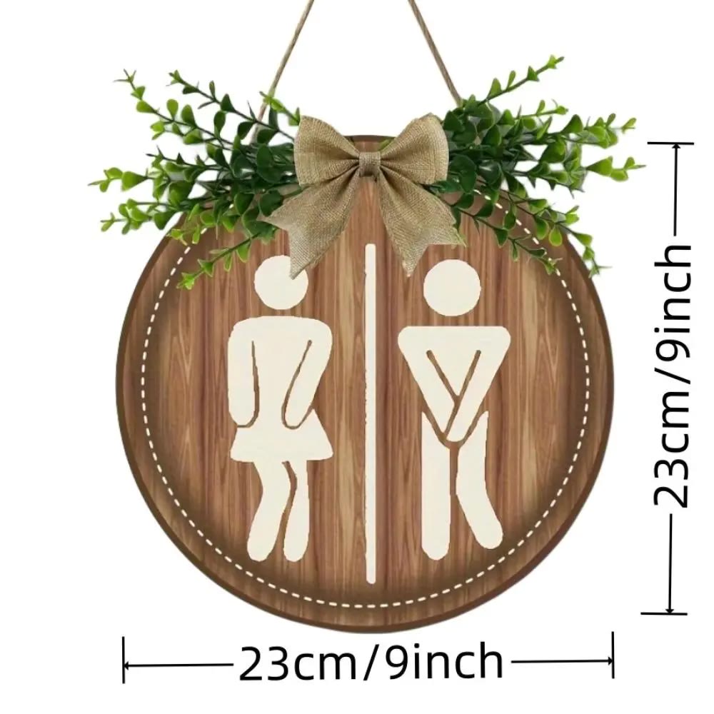 Round Wooden Restroom Sign With Greenery and Bow - photo 2