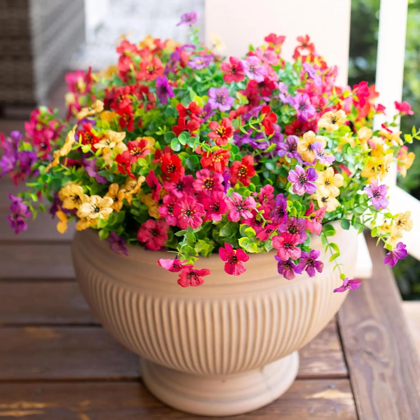 Mixed Colour Artificial Daisies and Leaves in Ribbed Pot
